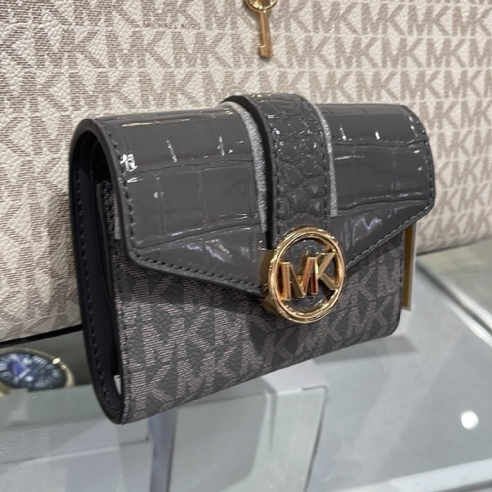 MICHAEL KORS CARMEN MEDIUM FLAP LOGO AND FAUX LEATHER WALLET 
HEATHER GREY MULTI